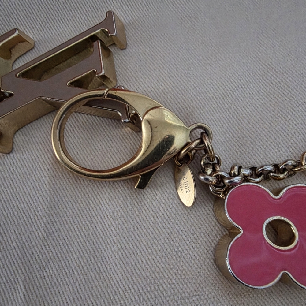 Authentic Louis Vuitton Floral Pink and Gold Key Holder a solid pink color - Picture 14 of 16